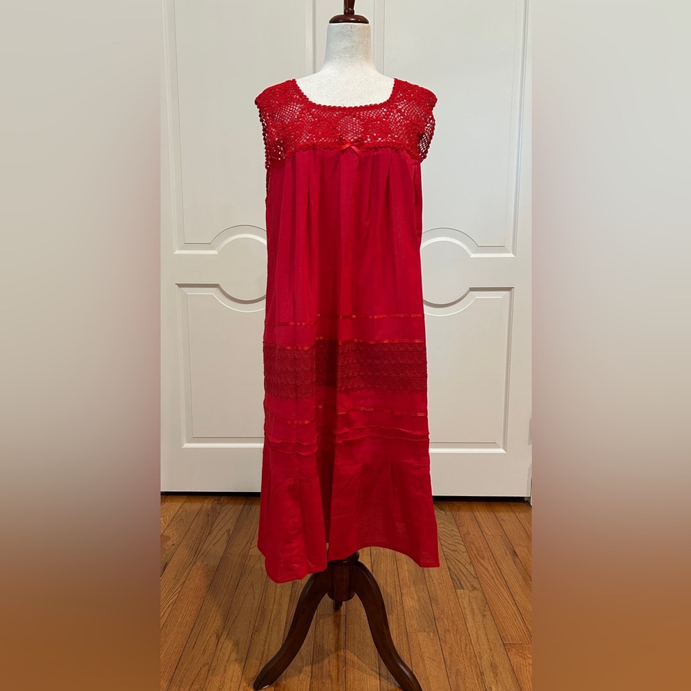 Artisanal Mexican women’s  summer dress is made with crochet and cotton manta.